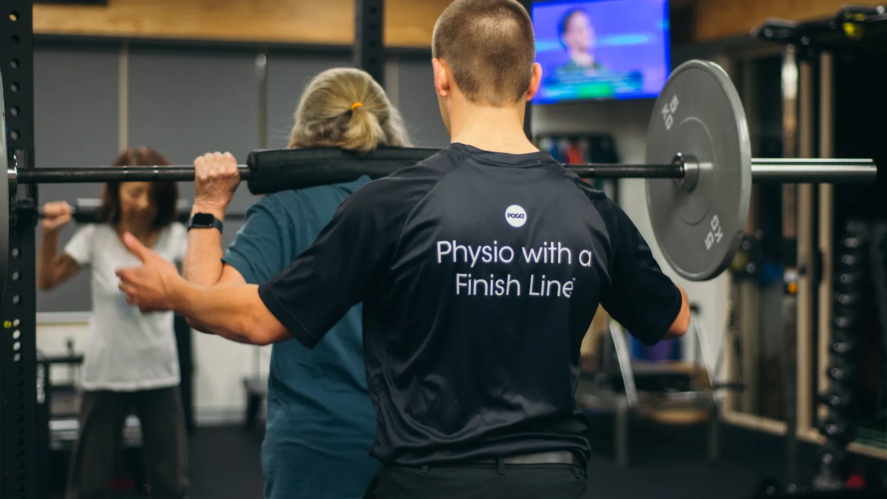 Pogo Physio clinician help a client preform recovery exercises