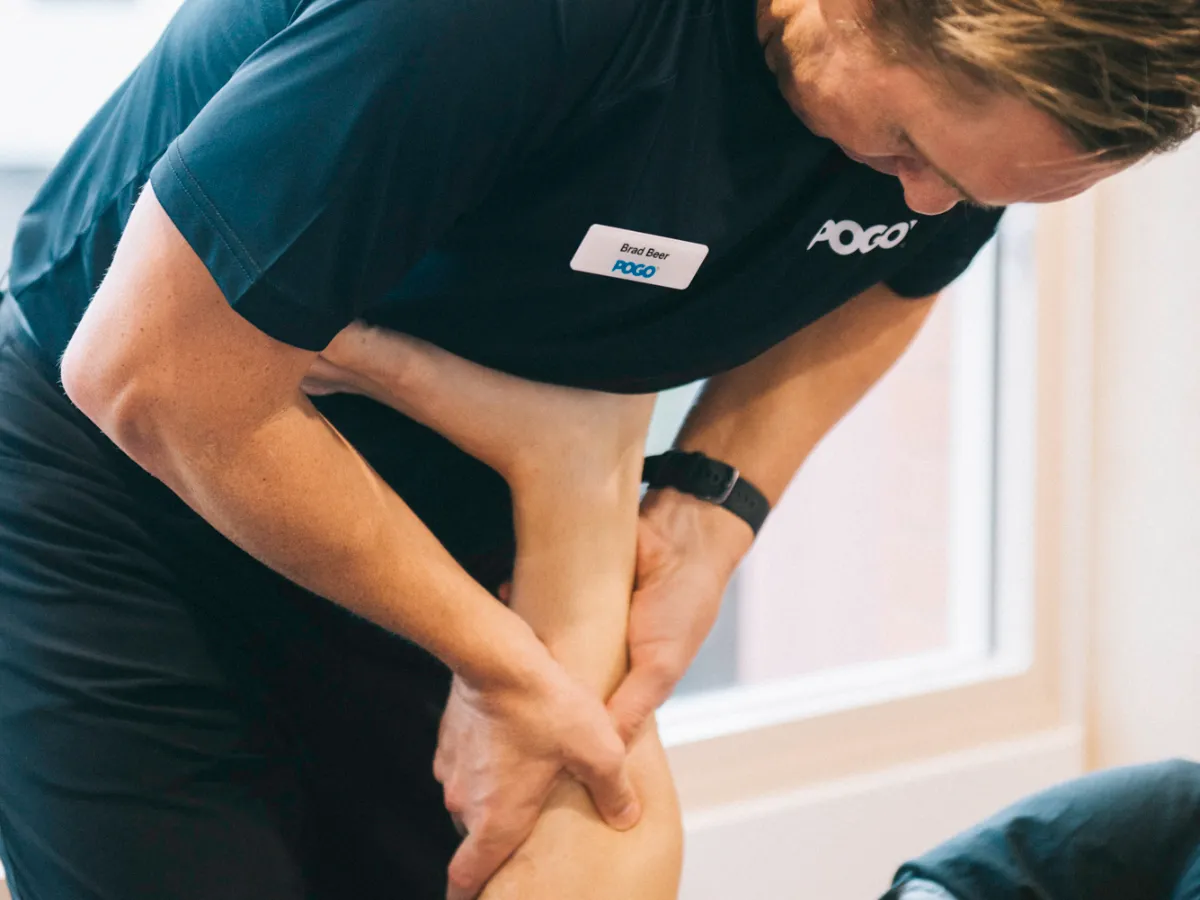 Physiotherapist treating a tendon injury